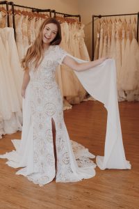 girl in wedding dress with long sleeve