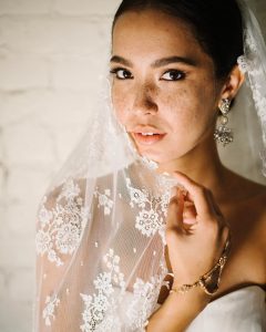 veils: woman in traditional lace veil