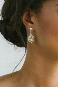 woman in champagne earring