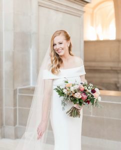 bride in off the shoulder crepe dress
