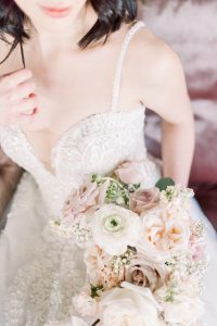 bride in aline gown with plunging neck and thin straps