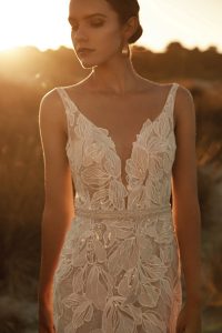 beaded fitted boho wedding dress with leaf detail