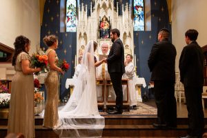 jordan and fiance exchanging vows at the alter
