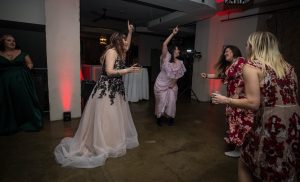 bridal party dancing at unique wedding