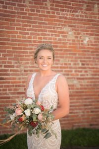 real bride in fitted lace wedding gown